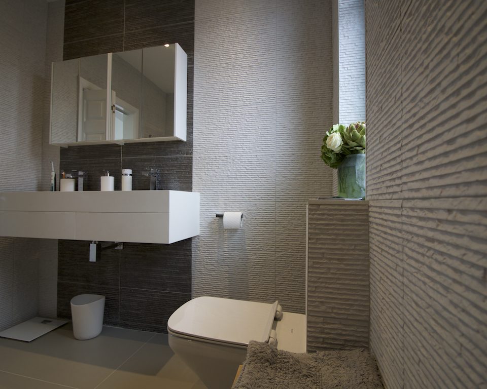 Bathroom in a large loft extension which involved raising the height of the roof